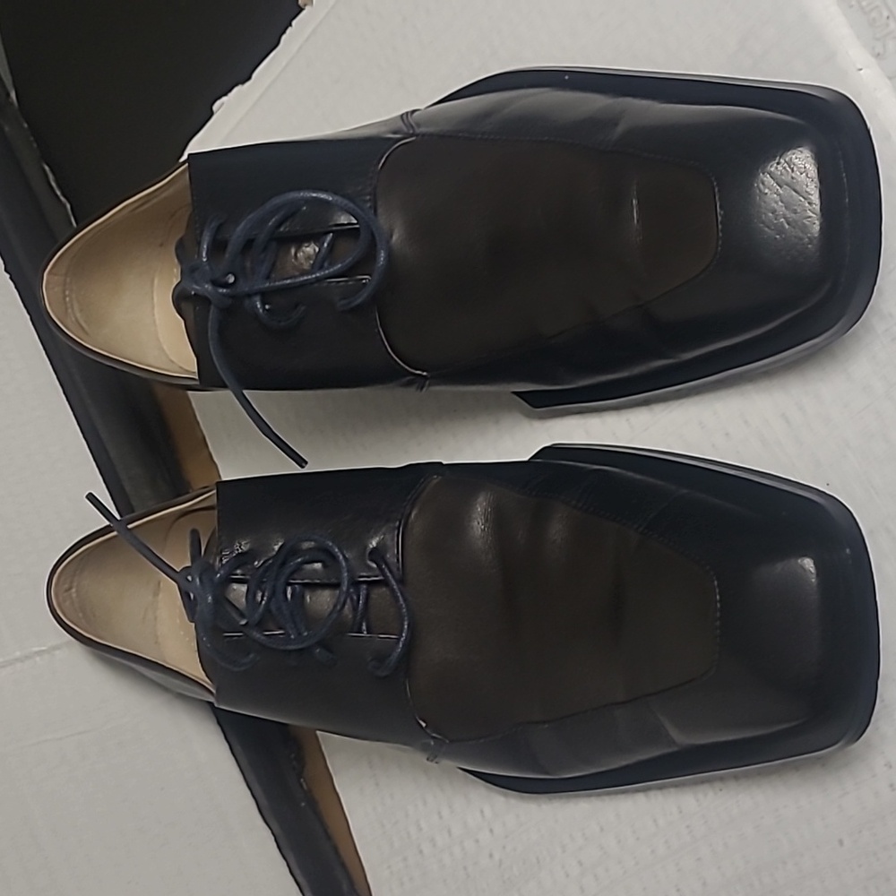 Mens black leather dress shoes (Todd Welsh)